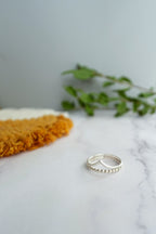 The Charm Ring